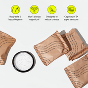 Menstrual disc shown next to four sealed paper packages with product benefit icons above